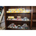 A collection of various boxed die-cast vehicles to