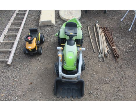A children's pedal tractor and trailer
