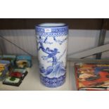 A blue and white Oriental decorated stick stand
