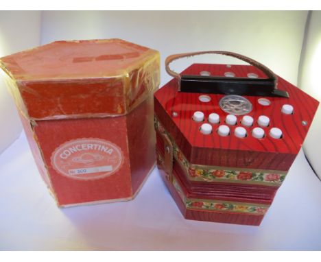 Scholar accordion in original case.