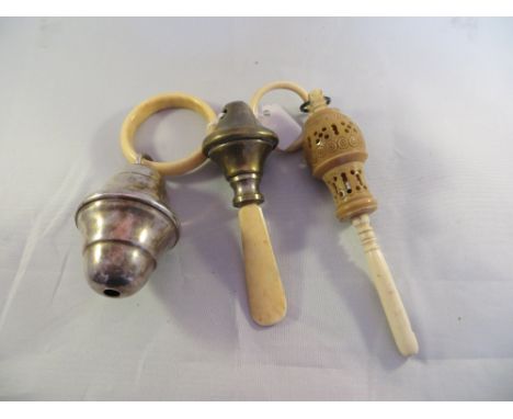 3x bone and white metal babies rattles.