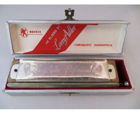 Larry Adler pro Hohner harmonica.