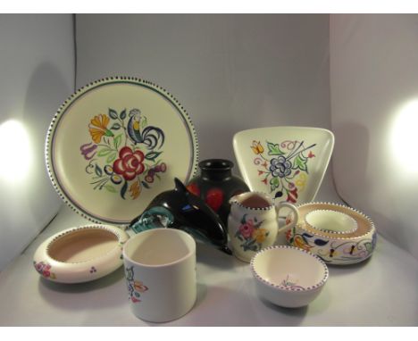 Collection of Poole pottery items. Consisting of plate, 2x dishes, pot, jug, small bowl, round ring posy dish, dolphin orname