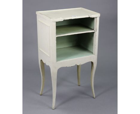 A French-style cream painted wooden bedside cabinet fitted with open shelf, &amp; on slender cabriole legs, 15¾” wide x 28” h