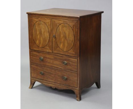 An early 19th century mahogany chest commode with lift top &amp; mock cupboard doors &amp; drawer-fronts, on four splay feet,