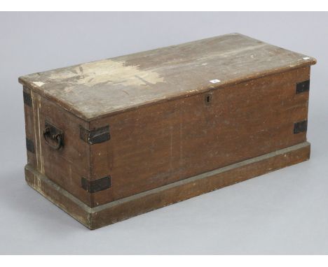 An early 20th century iron-bound grained-pine blanket box with a hinged lift-lid, &amp; with wrought-iron side handles, 37¼” 