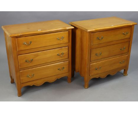 A pair of walnut-finish small chests each fitted three long drawers with gilt-ormolu handles, &amp; on short legs, 29½” wide 