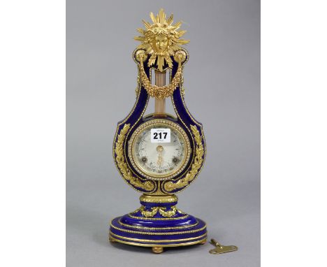 A Franklin Mint reproduction&nbsp;“Marie Antoinette Victoria &amp; Albert Museum”&nbsp; mantel clock, in blue glazed porcelai