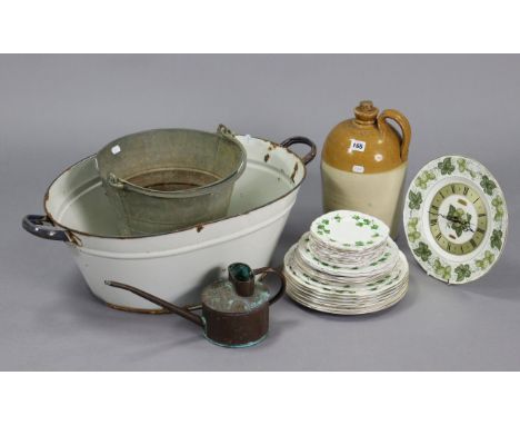 A stoneware flagon, 13” high; together with an enamelled oval foot bath; two suitcases; a modern wall clock, etc.