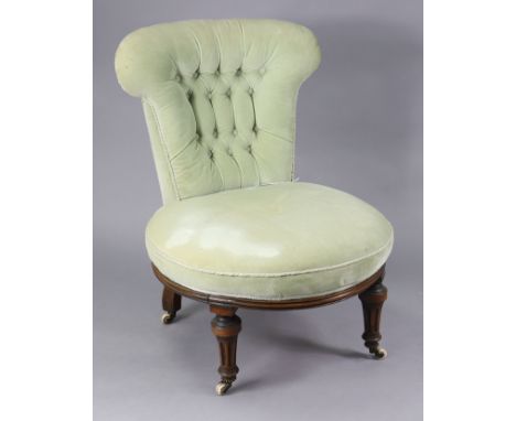 A Victorian nursing chair with shaped buttoned-back &amp; sprung seat upholstered green blue velour, &amp; on short turned &a