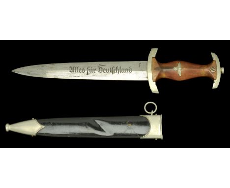 A German Second World War NSKK Dagger. A generally good blade with much original cross grain finish remaining. One item of su