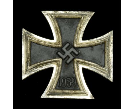 An Iron Cross First Class 1939 in its Presentation Case. The Iron Cross is of a slightly convex shape, and probably a mid-War