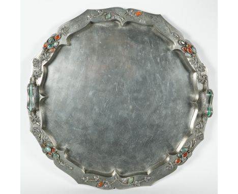 ARTS AND CRAFTS ENAMEL PEWTER TRAY
of serpentine circular form, the rim inset with cabouchon agates and engraved with animals