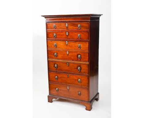 GEORGE III MAHOGANY SECRETAIRE CHEST
with two drawers above a double secretaire drawer and three further drawers, on bracket 