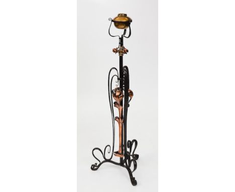 ART NOUVEAU COPPER AND CAST IRON TRIPOD STANDARD LAMP
with adjusting column and foliate copper details, maximum extended heig