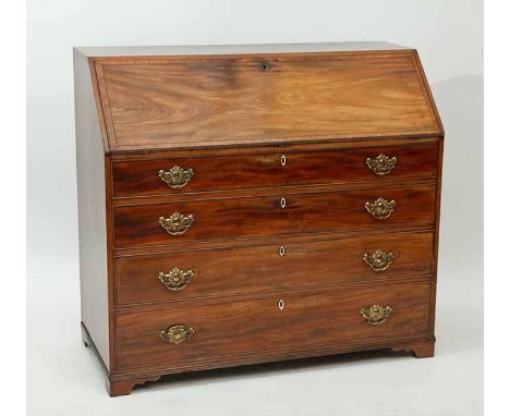 GEORGE III MAHOGANY BUREAU
the fall opening to reveal a satinwood interior, above four drawers, on bracket feet, 110cm high, 