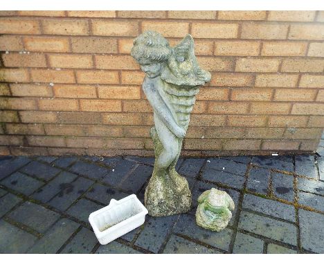 Stonework reclamation - a garden ornamental water feature depicting a cherub with shell, 69 cm (h), a small ornamental stone 