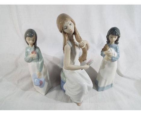 Nao by Lladro - three Nao ceramic figurines