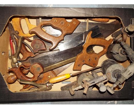 Tools - a good collection vintage handsaws and blow lamps, etc