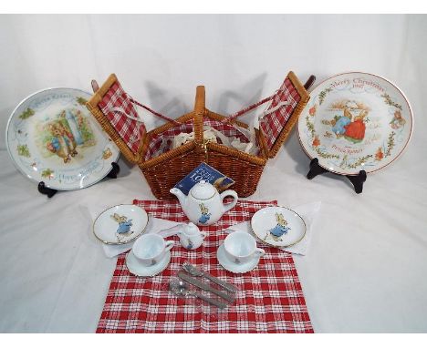 Peter Rabbit - a Peter Rabbit Beatrix Potter picnic basket containing a two place ceramic setting by Reutter Porzellan, Germa