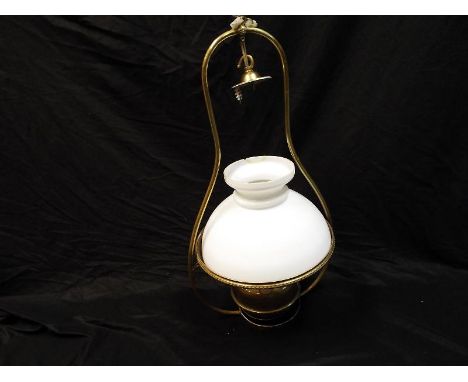 A brass pendant ceiling oil lamp converted to electricity approximately 66 cm (h) x 34 cm (d)