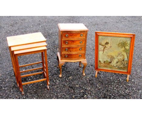 WALNUT BOWFRONTED CHEST WITH FOUR DRAWERS (75cm x 40cm x 36cm), NEST OF THREE WALNUT COFFEE TABLES (W: 48cm) AND A FIRESCREEN