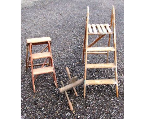 PAIR OF WOOD FOUR TREAD STEP LADDERS (H: 126cm CLOSED), SIMILAR PAIR OF STEP LADDERS AND A WOOD CLAMP [3]