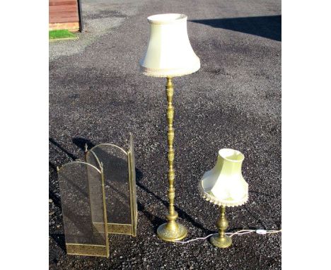 NEAR EASTERN BRASS BALUSTER STANDARD LAMP ON A CIRCULAR BASE (H: 141cm), WITH SHADE, SIMILAR TABLELAMP (H: 53cm), WITH SHADE 
