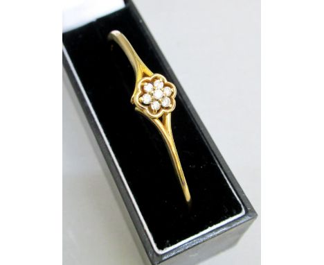 9ct GOLD BANGLE STAMPED 375 SET SEVEN DIAMONDS (APPROX. ½ct) IN A FITTED CASE (13.3g GROSS)
