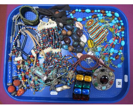 A Selection of Multi Bead Necklaces and Bracelets, a large circular Celtic style brooch, with hardstone style outer highlight