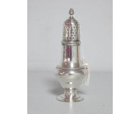A Georgian Hallmarked Silver Sugar Caster, R. Peaston, London 1771, with pierced pull off cover, on circular spreading base, 