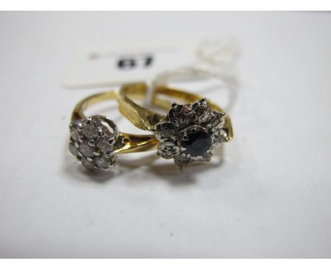 A Modern 18ct Gold Diamond Set Cluster Dress Ring, the brilliant cut stone claw set, between tapered shoulders, stamped "0.50