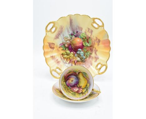 A collection of hand painted fruit scenes in the Worcester style to include a fine quality Crown Staffordshire cup and saucer