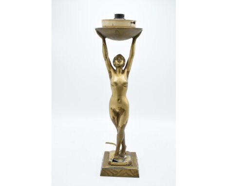 An Art-Deco nude figural lamp base with the lady supporting the light shade with impressed 'Limousin' signature to the base. 