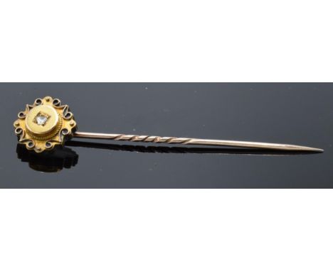 9ct gold diamond stick pin. Gross weight 2.3 grams. 7cm long. 