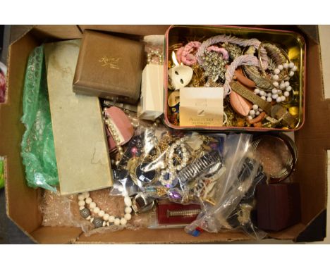 A large collection of assorted jewellery and watches to include beads, watches, earrings, necklaces, bangles, brooches, Swaro