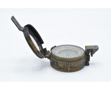 A World War Two (WW2) military MKII compass '1940' made by T G Co Ltd of London. 