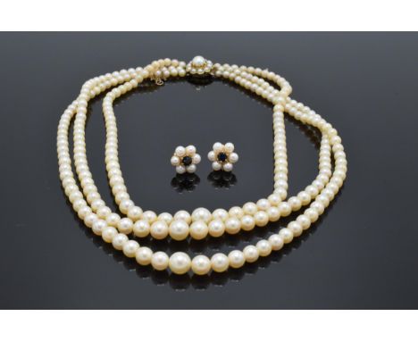 Three row cultured pearl necklace with 9ct gold clasp, together with similar cultured pearl and sapphire earrings also set in