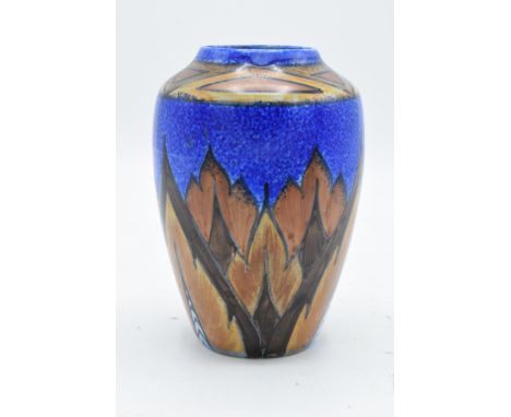 Clews and Co of Tunstall Chameleon Ware vase decorated with blue and orange decoration. 14cm tall. In good condition with no 