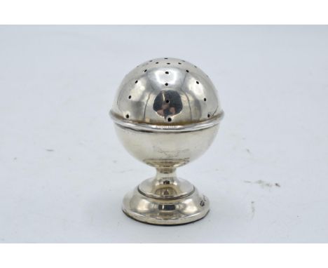 A silver ball shaped stick / hat pin holder. Birmingham 1920. 7cm tall. 