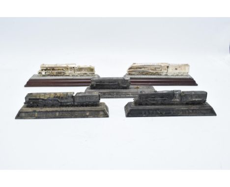 A collection of Railwayana interest items to include Britains paperweights of models 'L.N.E.R Locomotive No 10000', 'Flying S