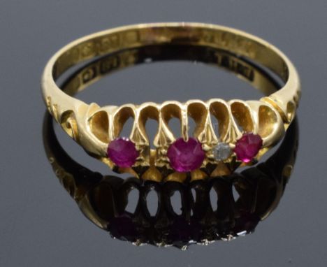 18ct gold ruby and diamond ring. Hallmarked for Birmingham 1910. UK size O/P. 2.4 grams gross weight. 