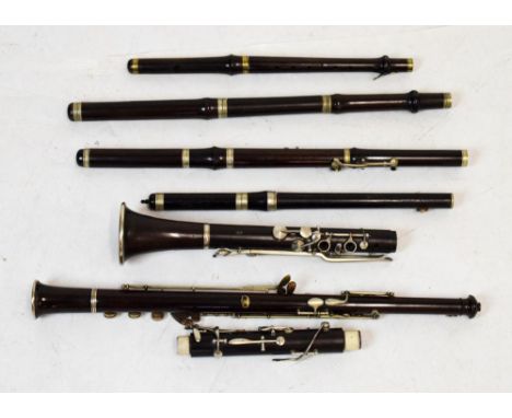 Collection of various branded 20th Century clarinet bells, tubes etc to include, J. Wallis, London, Hawkes &amp; Co, London, 
