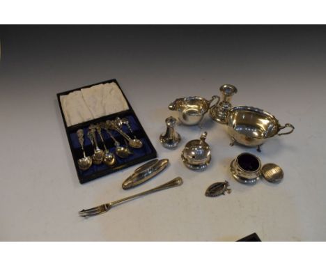 Assorted silver to include; George V silver two handled sugar basin and cream jug, Chester 1924, George VI three piece cruet 