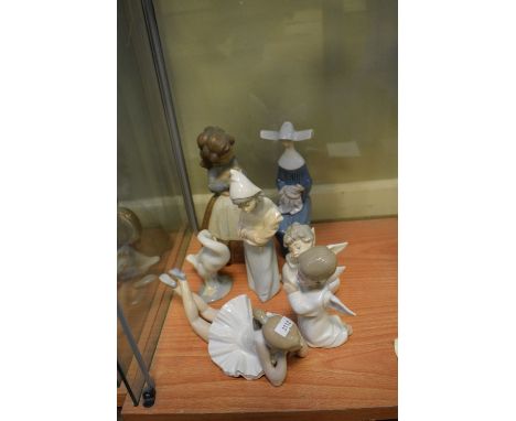 Quantity of Lladro and Nao figures  