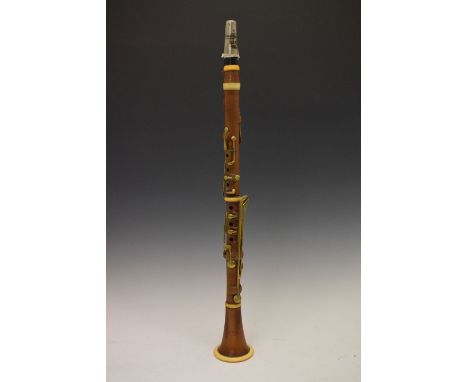 Rudall, Rose, Carte &amp; Co, 20 Charing Cross, London, boxwood and ivory clarinet, having brass keys, within black leather c