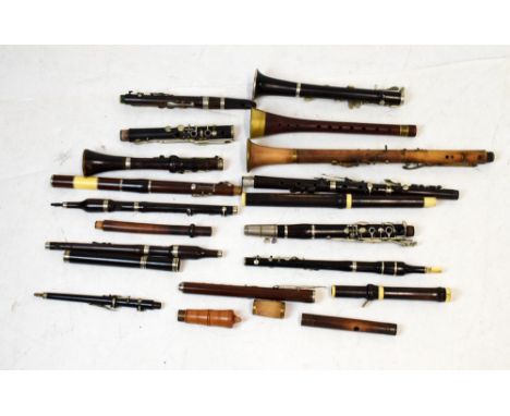 Assorted group of non-branded clarinet parts to include bells, mouth pieces, upper tubes, lower tubes etc  