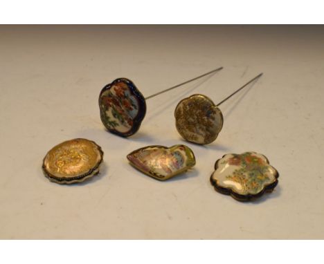Two early 20th Century Japanese Satsuma ceramic hatpins, together with three similar brooches, largest 4.5cm diameter (5)  