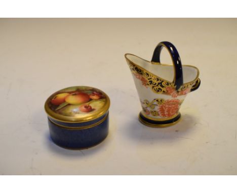 Royal Worcester porcelain fruit-painted trinket box of circular form, the push-on cover painted with apples and cherries and 