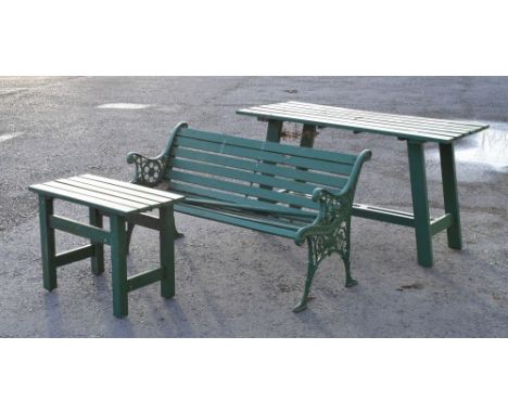 Cream painted three piece garden set comprising: slatted bench with cast metal ends, 127cm wide, six plank table, 136cm wide 